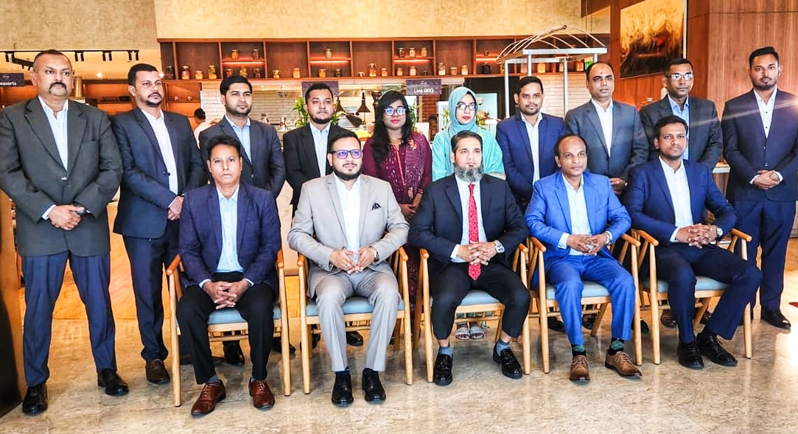 HANSA Management team group photo in a hotel restaurant
